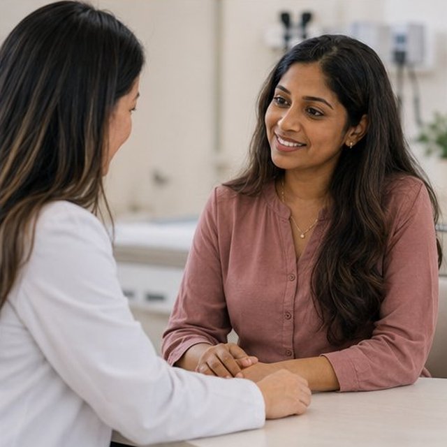 Doctor with an adult woman patient